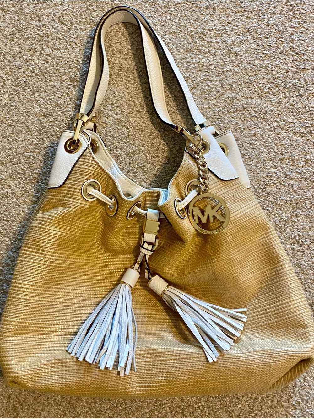 Michael Kors Gold and White Hobo with Tassel Charm